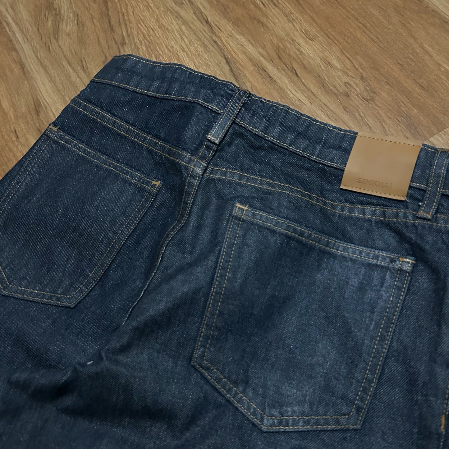 (28) Johnathan Simkai Coated Indigo Denim Baggy Wide Leg Jeans